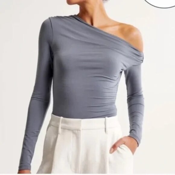 Abercrombie & Fitch Tops - Abercrombie & Fitch Blue Draped Asymmetrical Long Sleeve Thong Bodysuit XXS